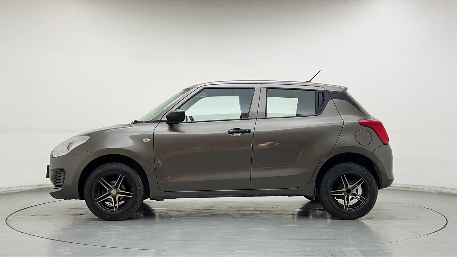 Used 2020 Maruti Suzuki Swift LXi Petrol Manual exterior LEFT SIDE VIEW