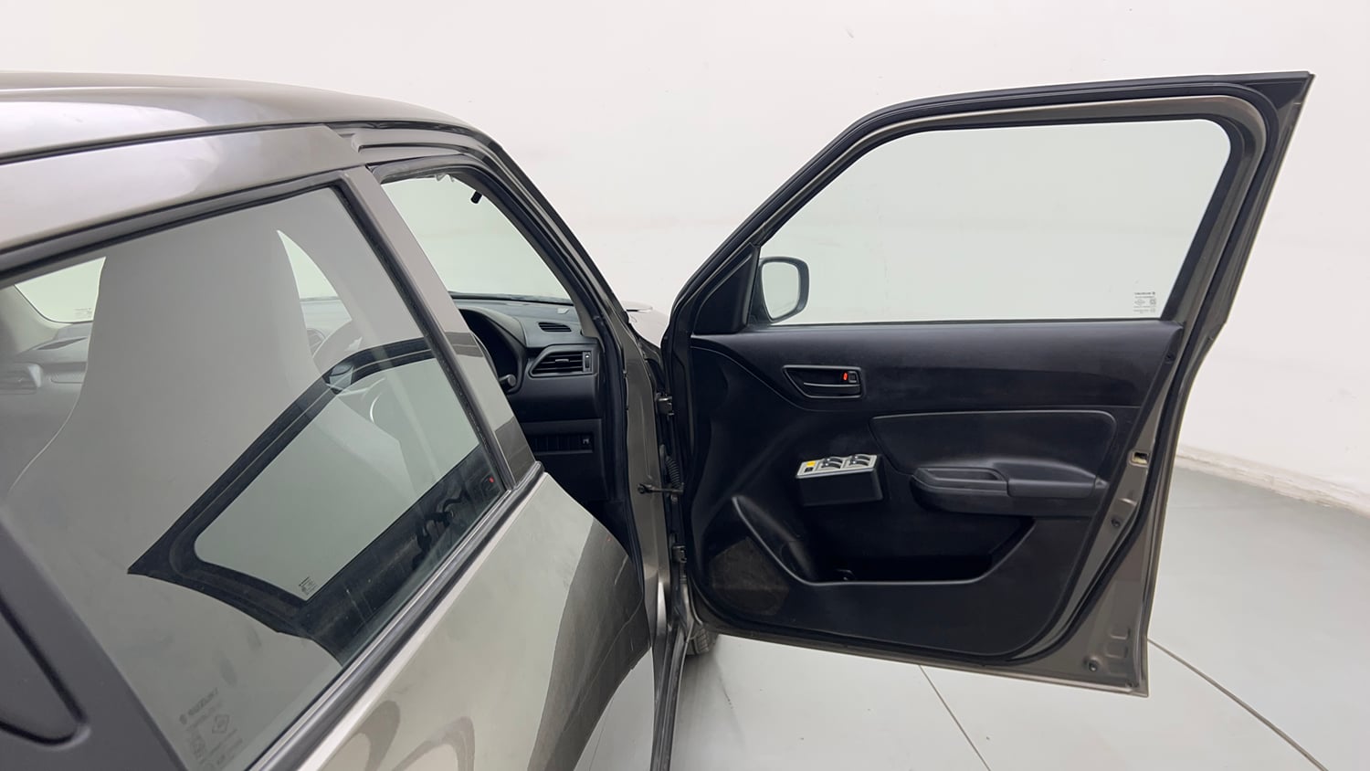 Used 2020 Maruti Suzuki Swift LXi Petrol Manual interior RIGHT FRONT DOOR OPEN VIEW