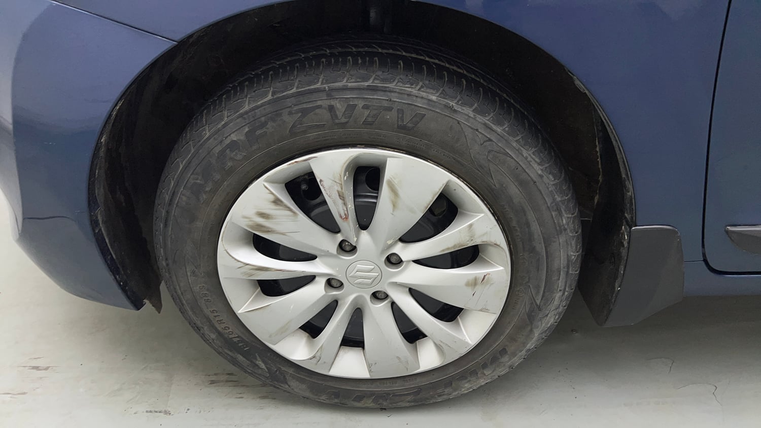 Used 2017 Maruti Suzuki Baleno Delta 1.2 Petrol Manual tyres LEFT FRONT TYRE RIM VIEW