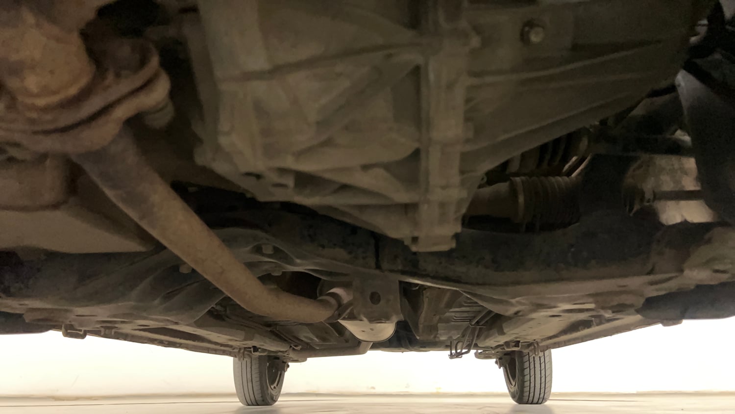 Used 2015 Maruti Suzuki Celerio VXi AMT Petrol Automatic extra FRONT LEFT UNDERBODY VIEW