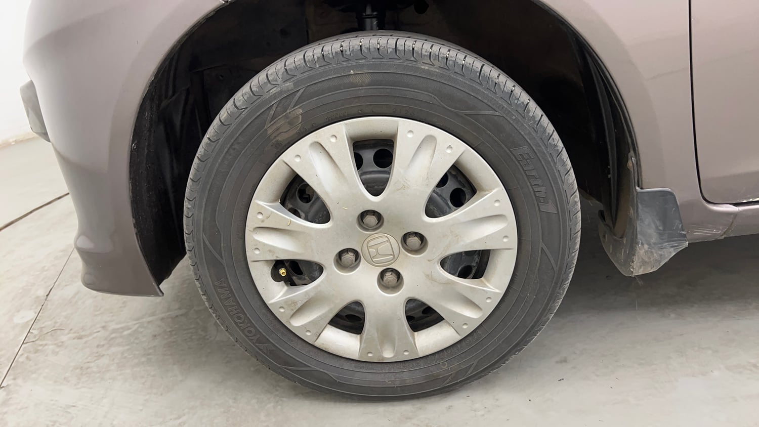 Used 2013 Honda Brio S MT Petrol Manual tyres LEFT FRONT TYRE RIM VIEW