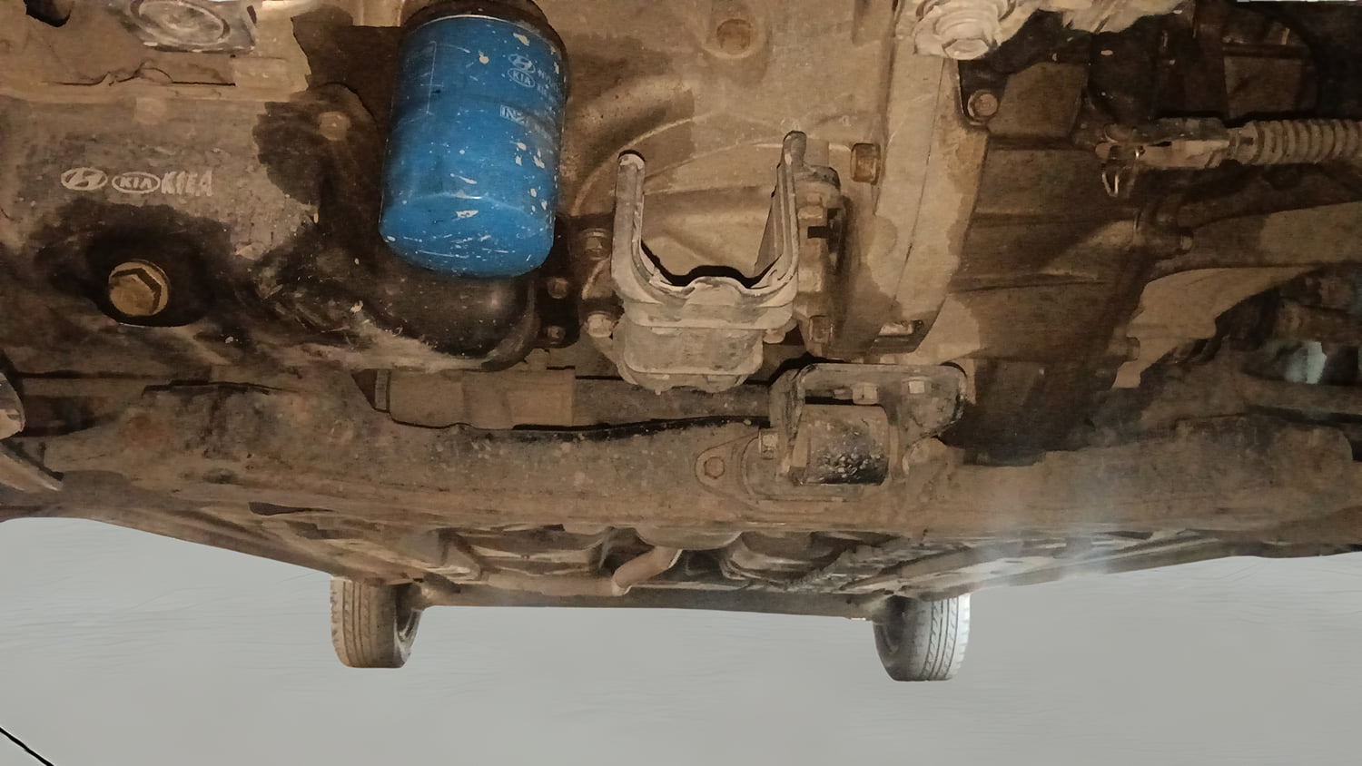 Used 2015 Hyundai Grand i10 Sportz 1.2 Kappa VTVT Petrol Manual extra FRONT LEFT UNDERBODY VIEW
