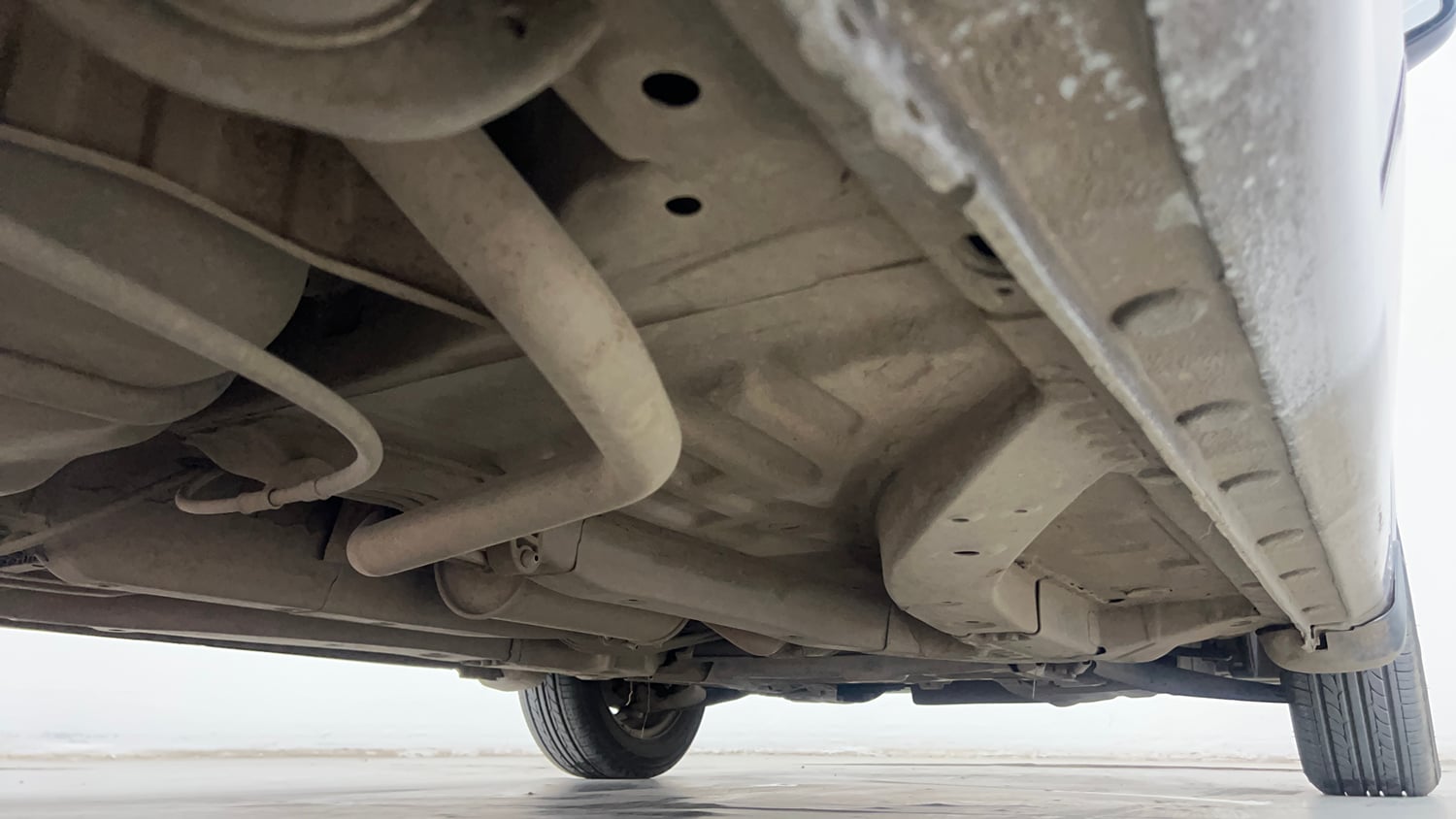 Used 2013 Honda Brio S MT Petrol Manual extra REAR RIGHT UNDERBODY VIEW