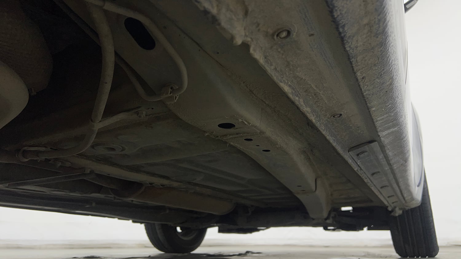 Used 2019 Maruti Suzuki Dzire ZXi Plus AMT Petrol Automatic extra REAR RIGHT UNDERBODY VIEW