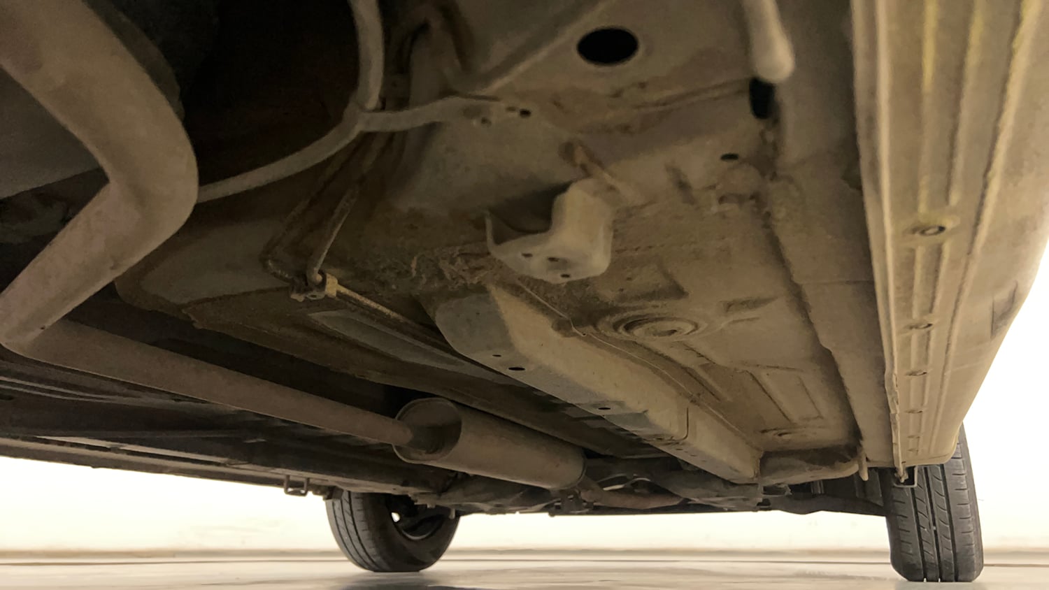 Used 2015 Maruti Suzuki Celerio VXi AMT Petrol Automatic extra REAR RIGHT UNDERBODY VIEW
