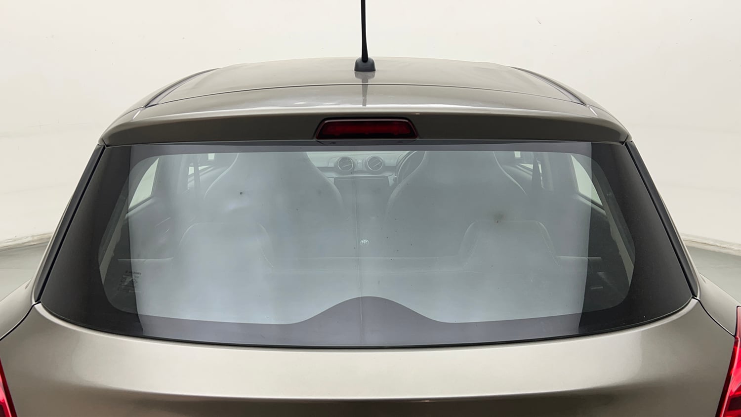 Used 2020 Maruti Suzuki Swift LXi Petrol Manual exterior BACK WINDSHIELD VIEW