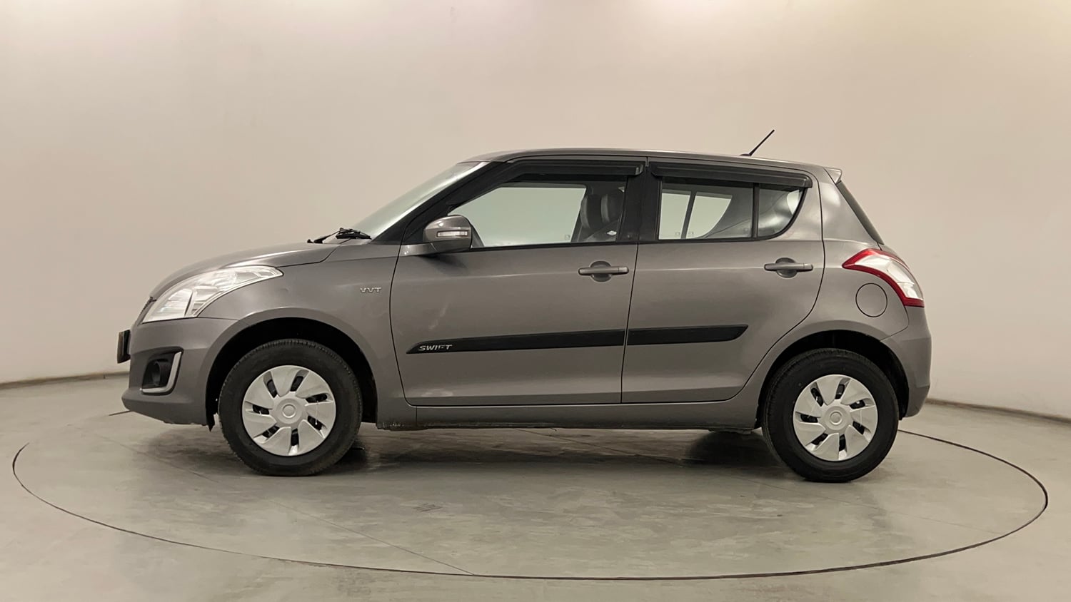 Used 2017 Maruti Suzuki Swift VXi Petrol Manual exterior LEFT SIDE VIEW