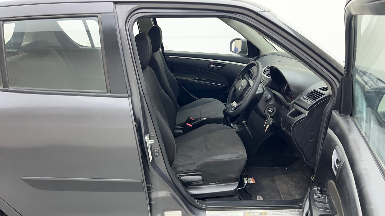 Used 2015 Maruti Suzuki Swift VXi Petrol Manual interior RIGHT SIDE FRONT DOOR CABIN VIEW