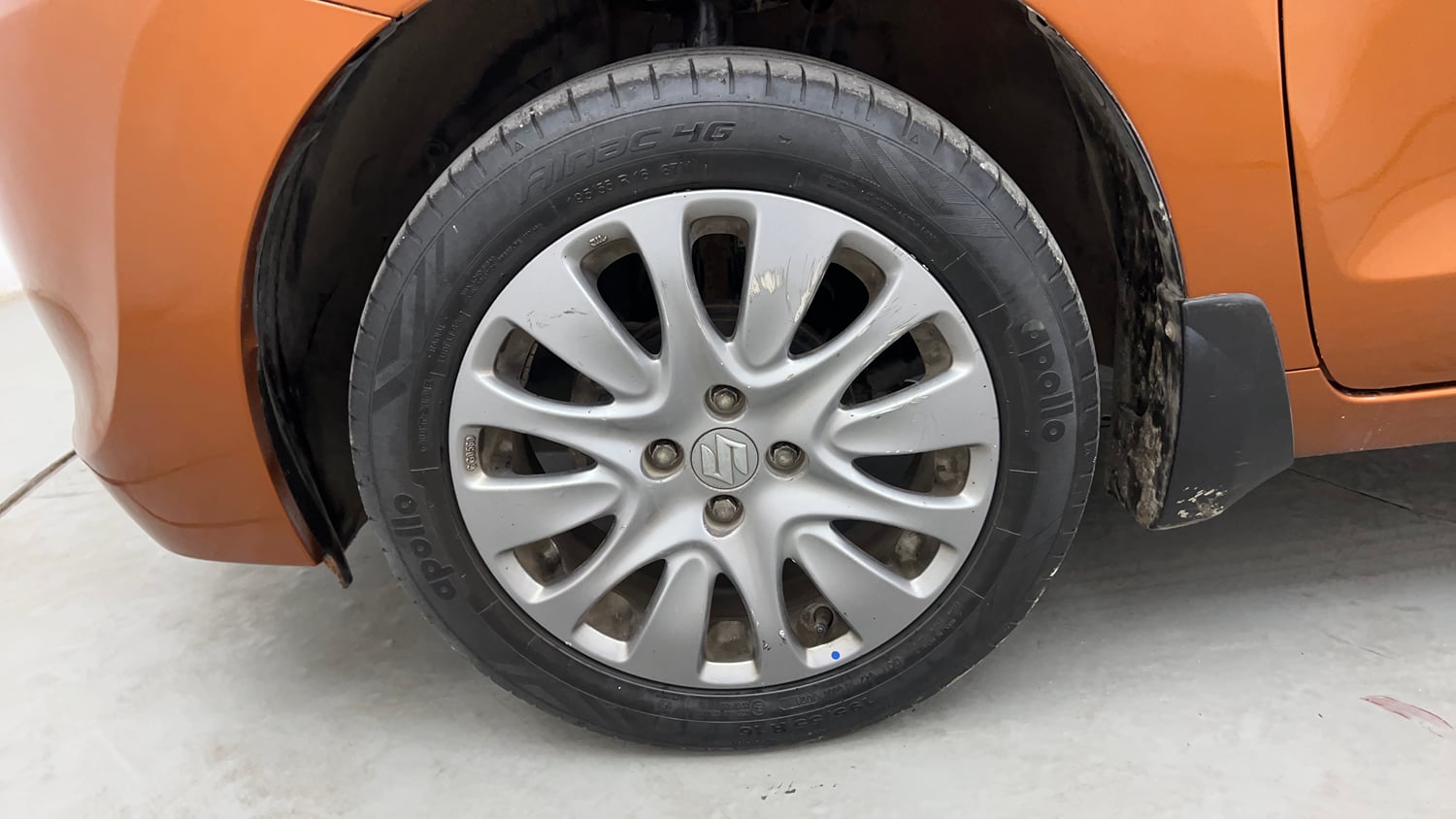 Used 2016 Maruti Suzuki Baleno Zeta 1.2 Petrol Manual tyres LEFT FRONT TYRE RIM VIEW