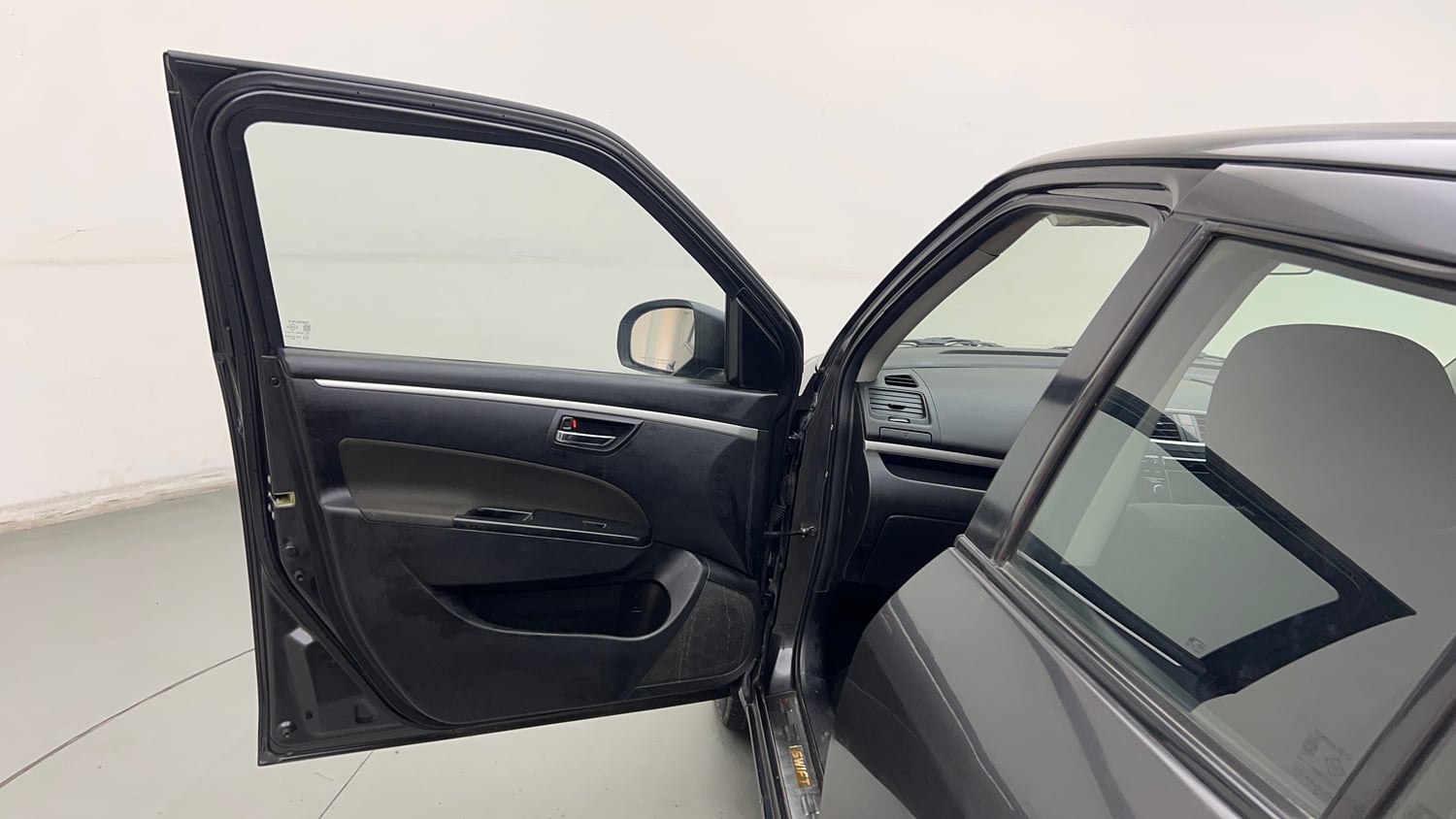 Used 2015 Maruti Suzuki Swift VXi Petrol Manual interior LEFT FRONT DOOR OPEN VIEW