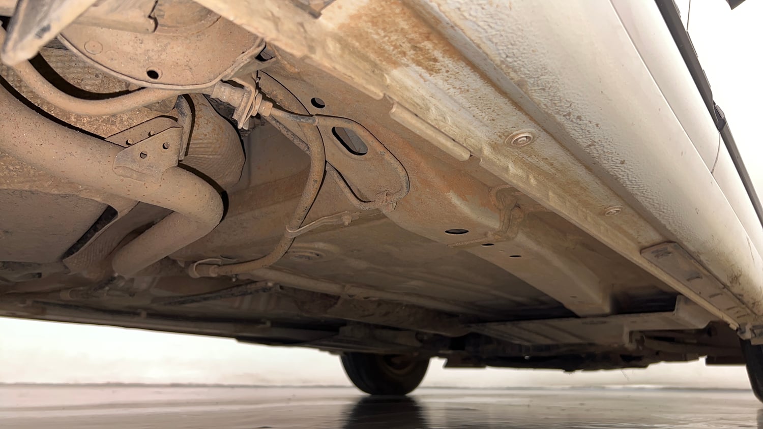 Used 2026 Maruti Suzuki Swift VXi AMT Petrol Automatic extra REAR RIGHT UNDERBODY VIEW