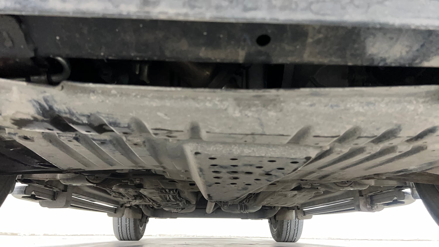 Used 2022 Tata Safari XZA Plus 6 S Dark Edition Diesel Automatic extra FRONT LEFT UNDERBODY VIEW