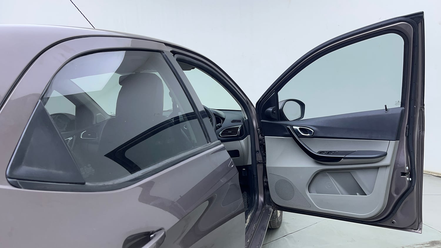 Used 2016 Tata Tiago Revotron XZ Petrol Manual interior RIGHT FRONT DOOR OPEN VIEW
