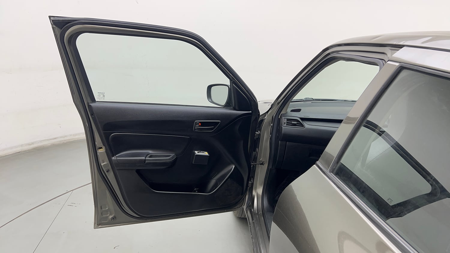 Used 2020 Maruti Suzuki Swift LXi Petrol Manual interior LEFT FRONT DOOR OPEN VIEW