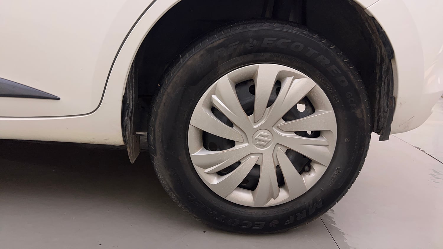 Used 2026 Maruti Suzuki Swift VXi AMT Petrol Automatic tyres LEFT REAR TYRE RIM VIEW