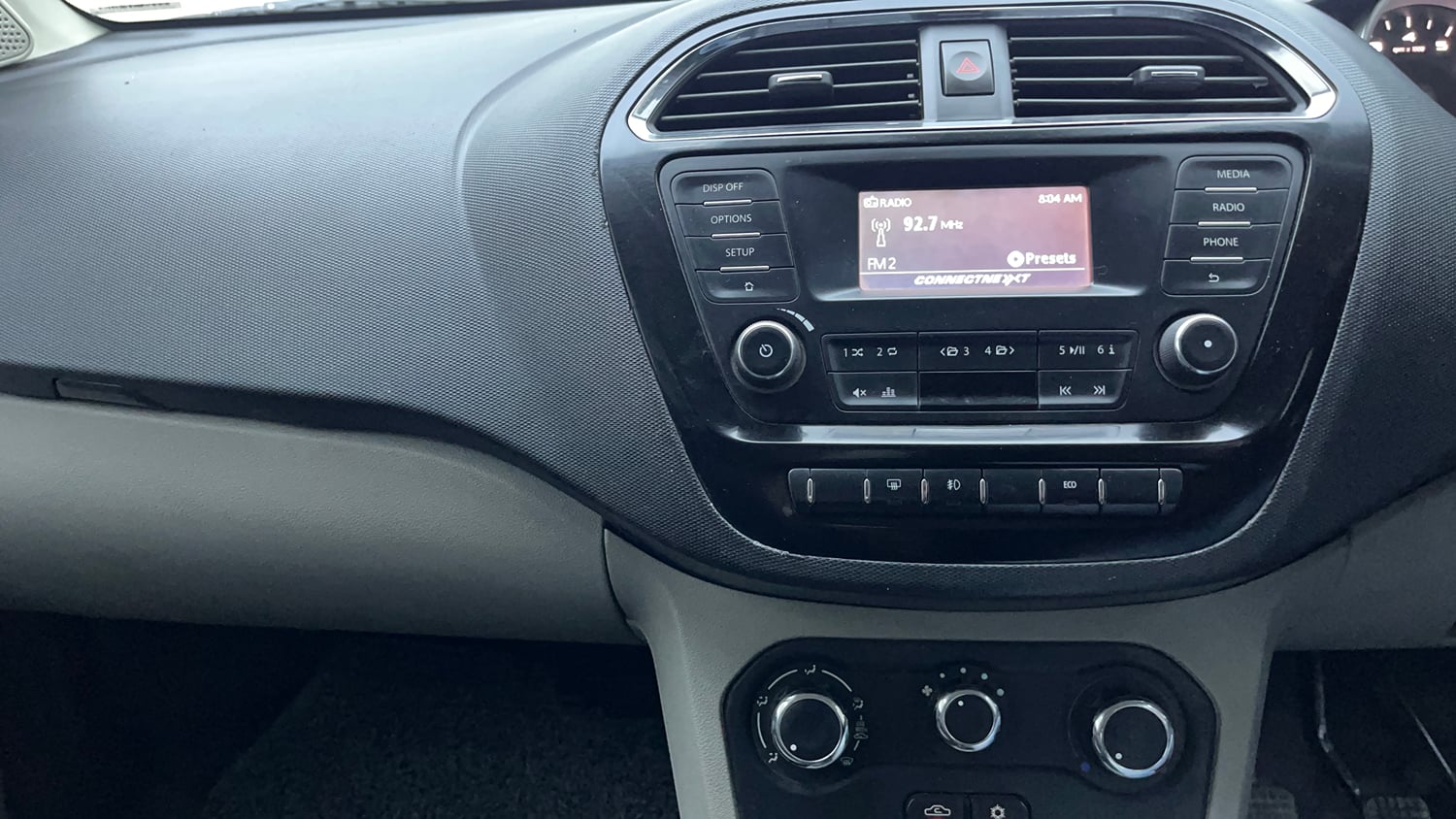 Used 2016 Tata Tiago Revotron XZ Petrol Manual interior MUSIC SYSTEM & AC CONTROL VIEW