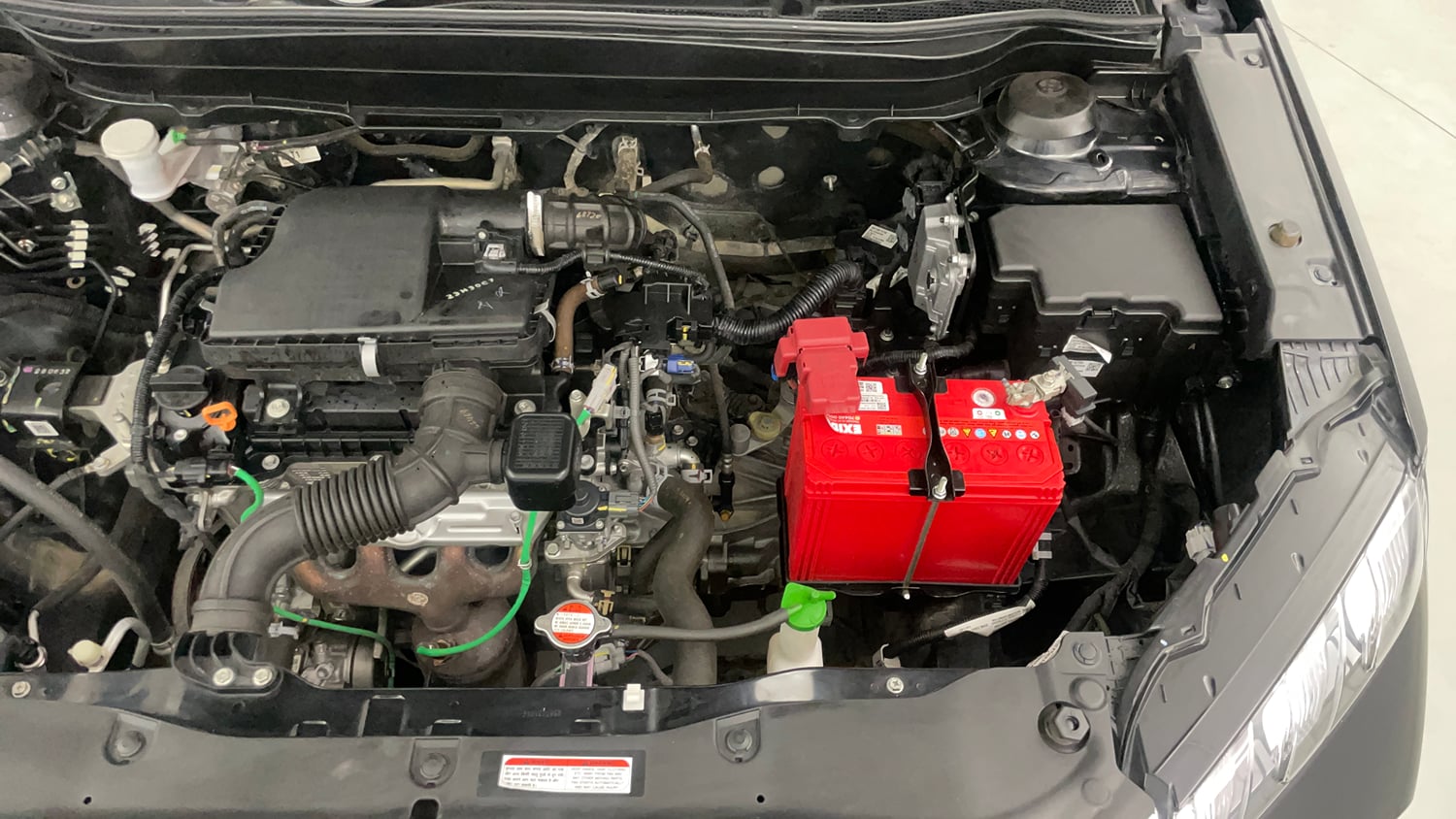 Used 2023 Maruti Suzuki Grand Vitara Zeta Smart Hybrid Petrol Manual engine ENGINE LEFT SIDE VIEW