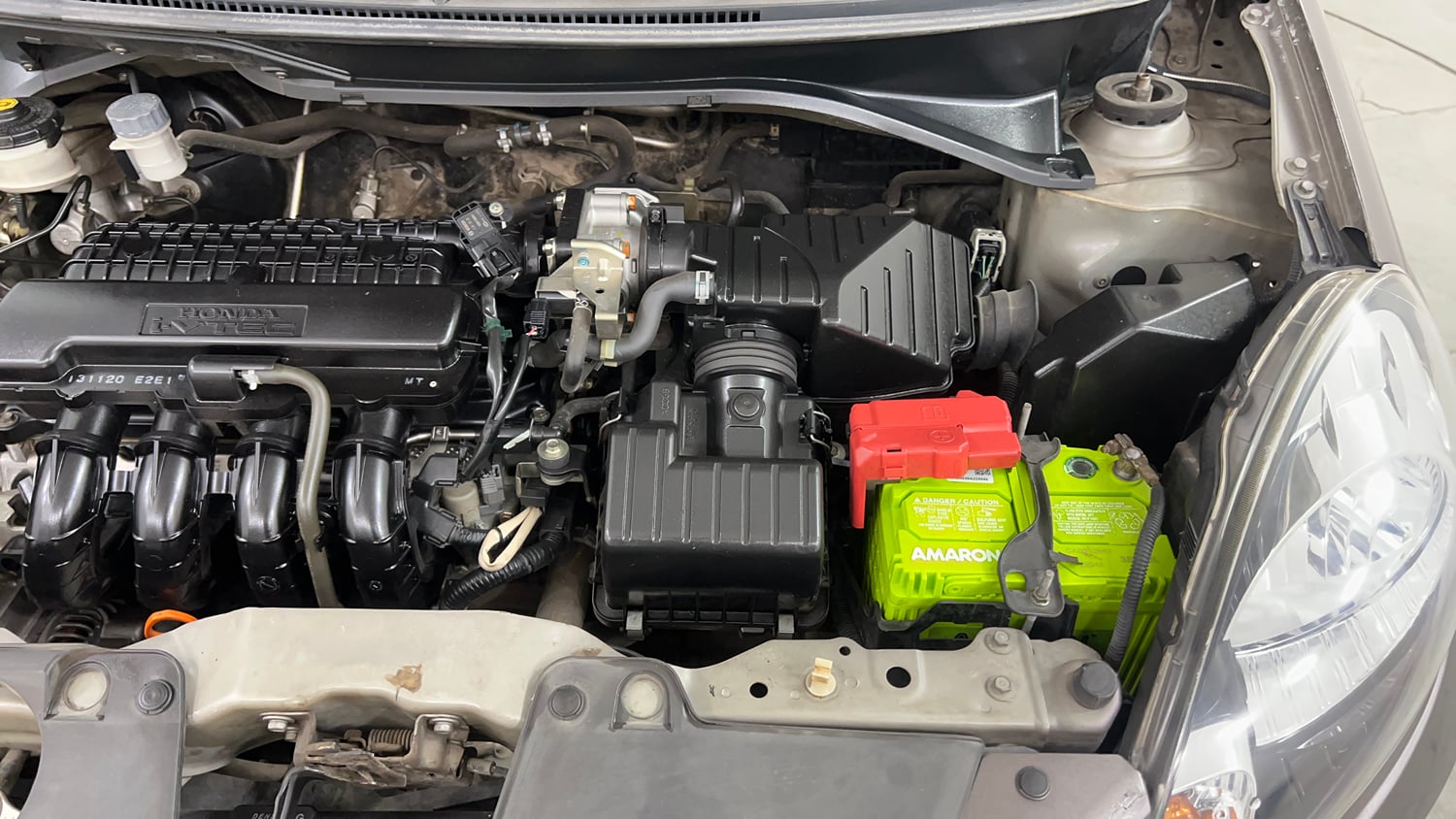 Used 2013 Honda Brio S MT Petrol Manual engine ENGINE LEFT SIDE VIEW