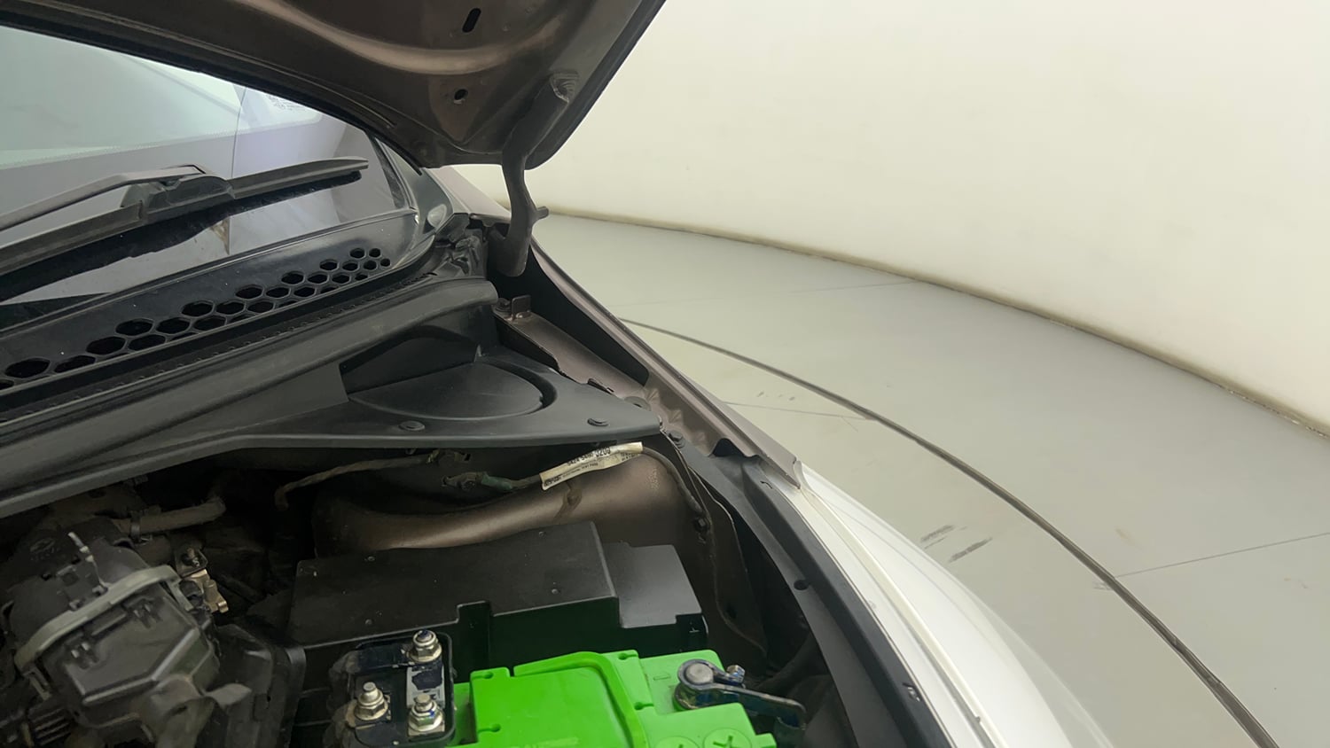 Used 2017 Tata Tiago Revotron XZA Petrol Automatic engine ENGINE LEFT SIDE HINGE & APRON VIEW