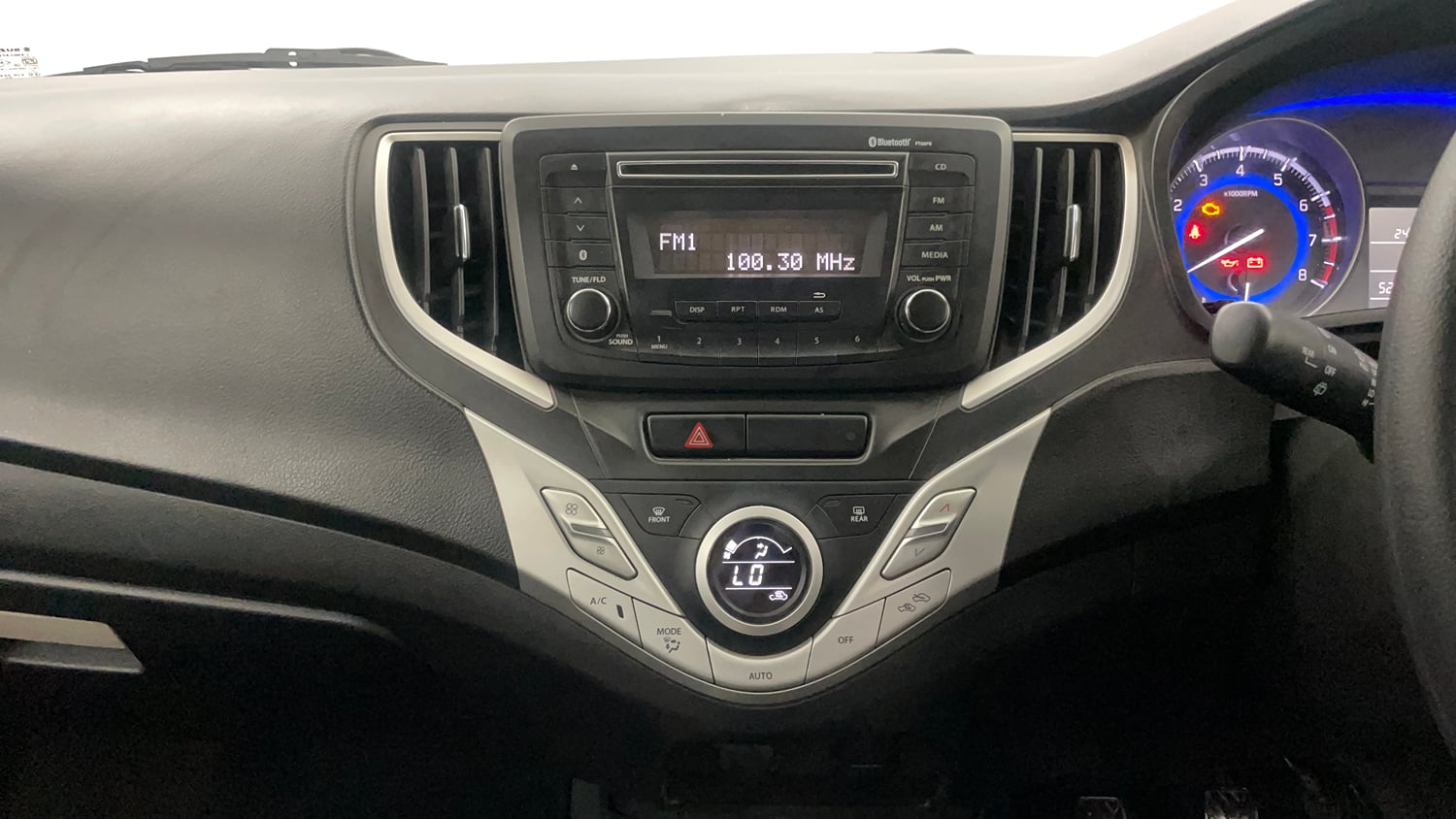 Used 2017 Maruti Suzuki Baleno Delta 1.2 Petrol Manual interior MUSIC SYSTEM & AC CONTROL VIEW