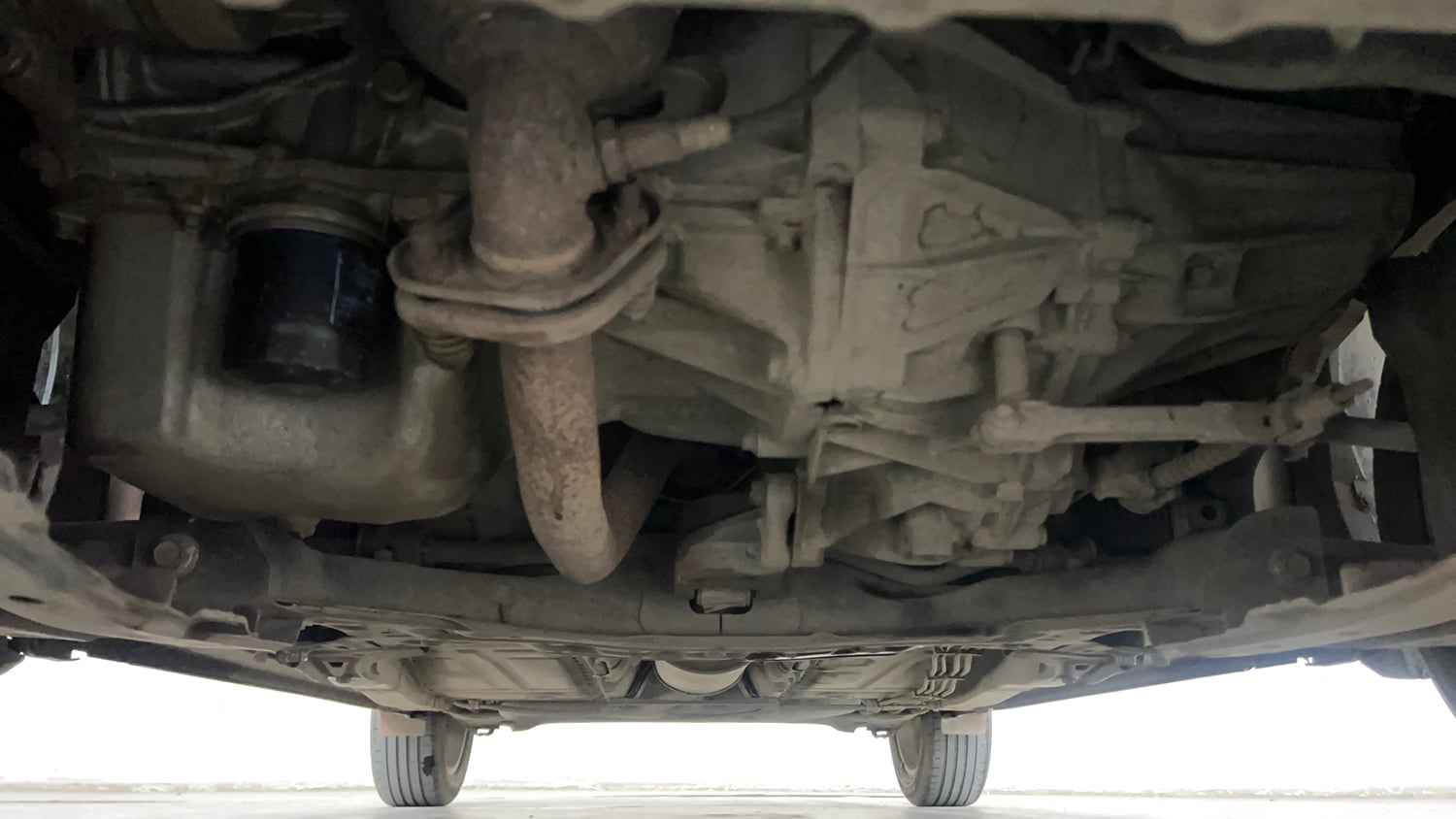 Used 2016 Maruti Suzuki Baleno Zeta 1.2 Petrol Manual extra FRONT LEFT UNDERBODY VIEW