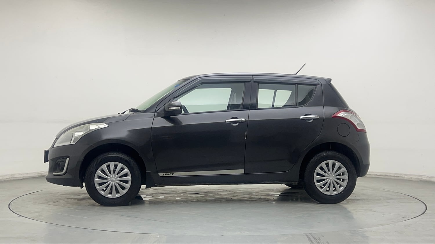 Used 2015 Maruti Suzuki Swift VXi Petrol Manual exterior LEFT SIDE VIEW