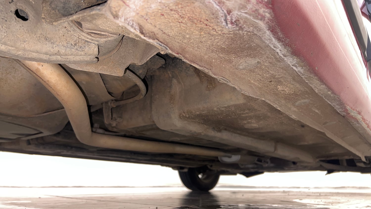 Used 2018 Hyundai Grand i10 Sportz AT 1.2 Kappa VTVT Petrol Automatic extra REAR RIGHT UNDERBODY VIEW