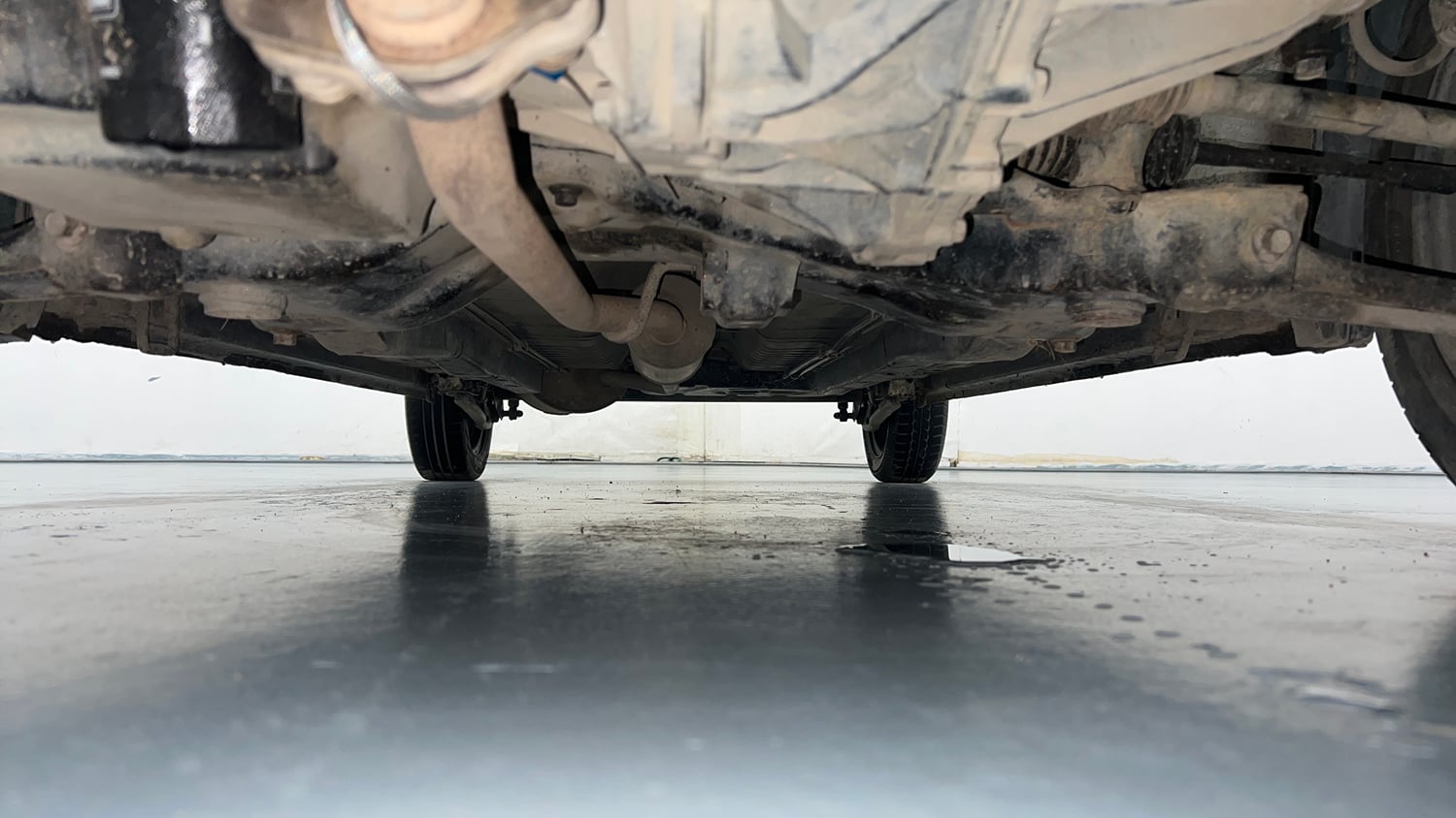 Used 2019 Maruti Suzuki Wagon R 1.0 VXI AMT Petrol Automatic extra FRONT LEFT UNDERBODY VIEW