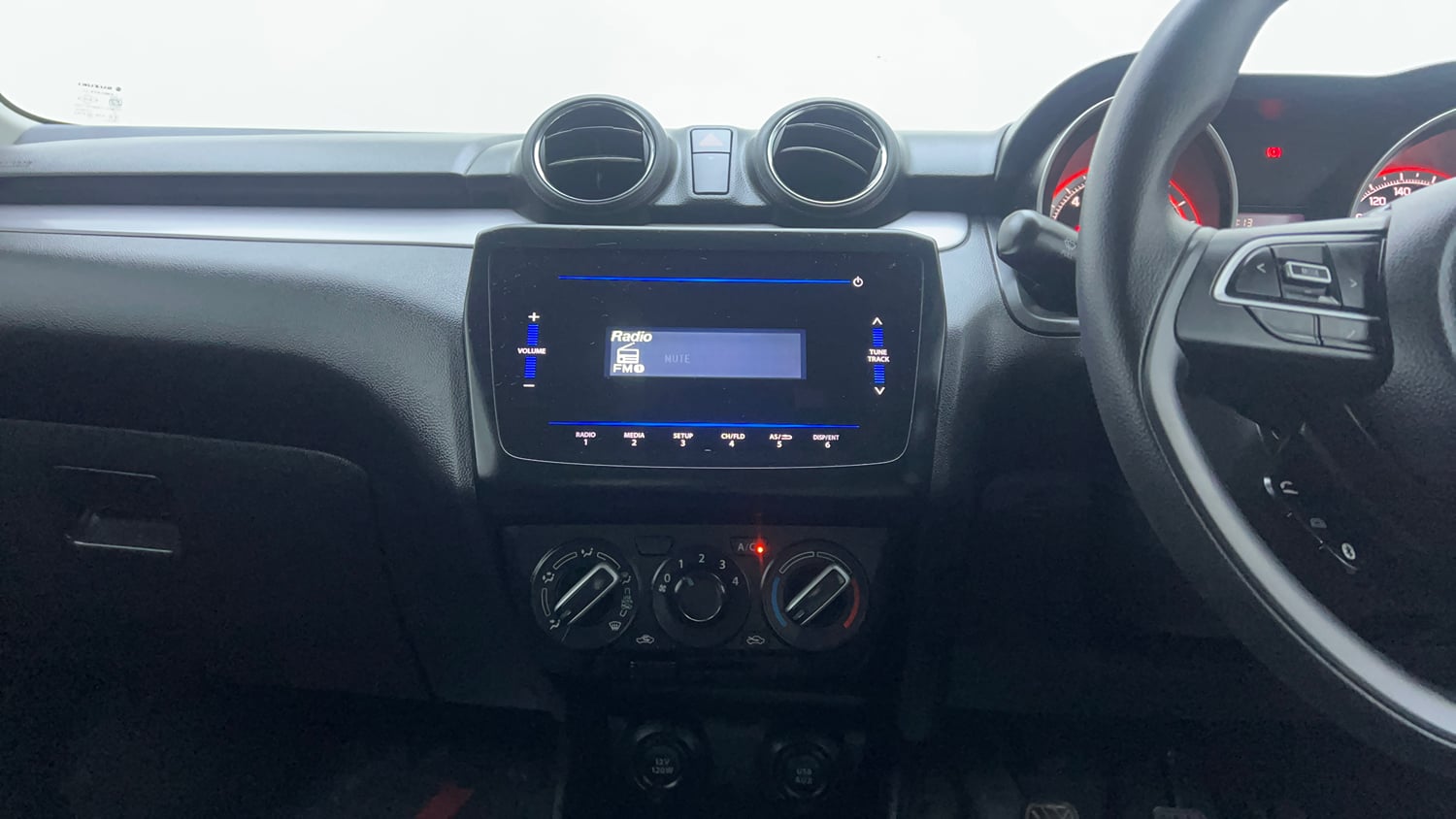 Used 2023 Maruti Suzuki Swift VXi Petrol Manual interior MUSIC SYSTEM & AC CONTROL VIEW