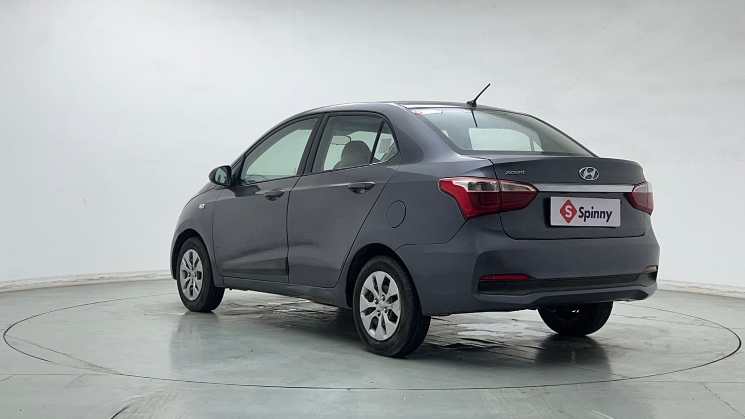 Used 2018 Hyundai Xcent E+ CNG (Outside Fitted) Cng Manual exterior LEFT REAR CORNER VIEW