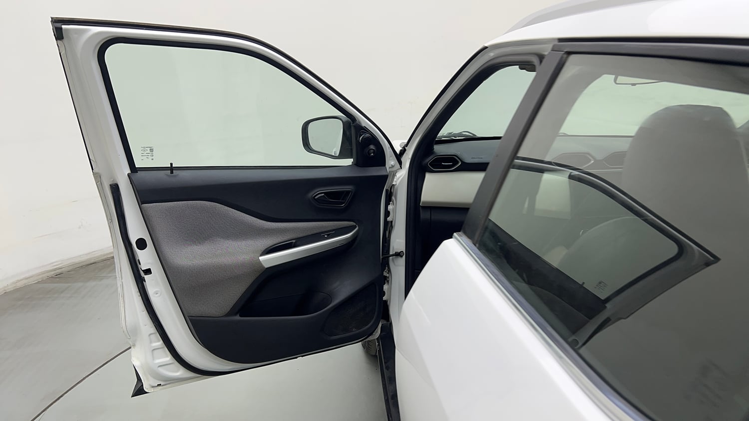 Used 2021 Nissan Magnite XE Petrol Manual interior LEFT FRONT DOOR OPEN VIEW