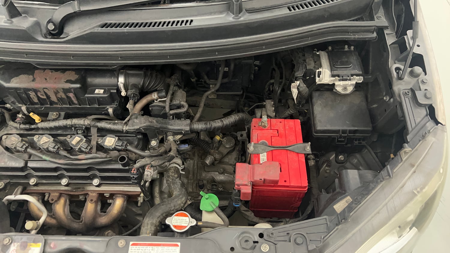Used 2022 Maruti Suzuki Wagon R VXi (O) 1.2 Petrol Manual engine ENGINE LEFT SIDE VIEW