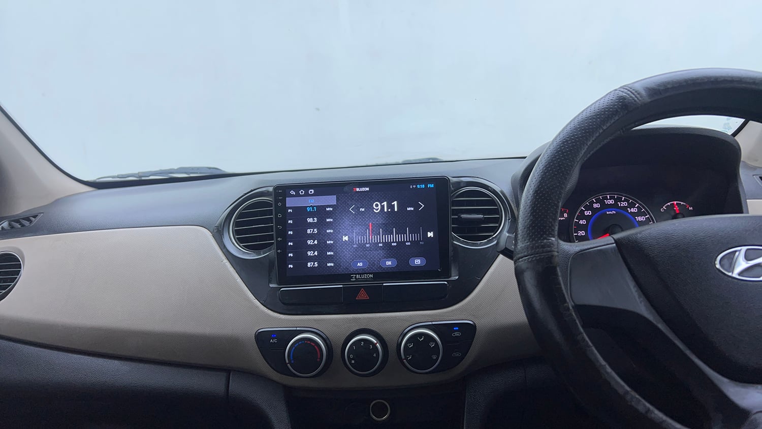 Used 2015 Hyundai Grand i10 Magna 1.2 Kappa VTVT Petrol Manual interior MUSIC SYSTEM & AC CONTROL VIEW