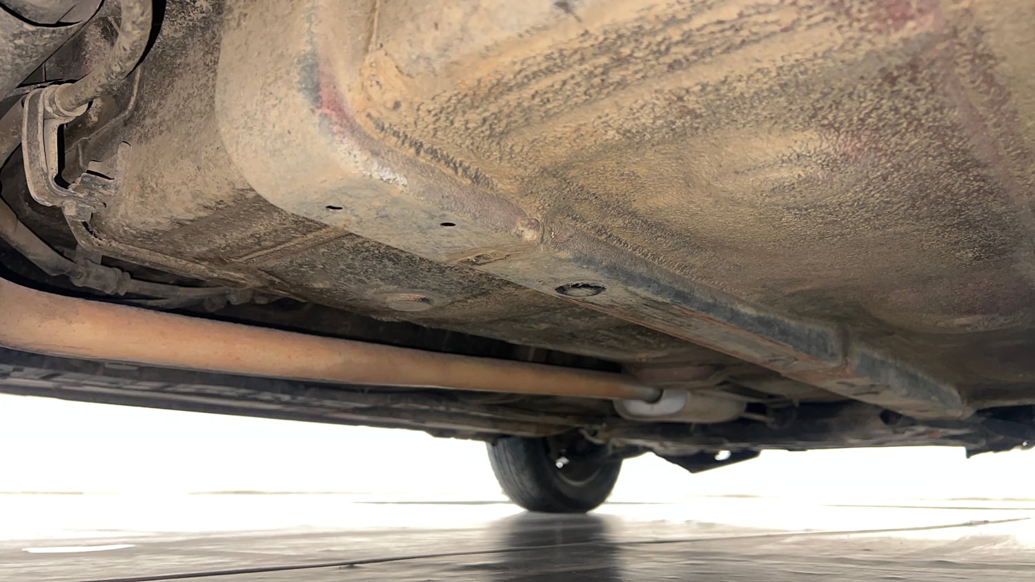 Used 2014 Hyundai Xcent SX 1.2 (O) Petrol Manual extra REAR RIGHT UNDERBODY VIEW