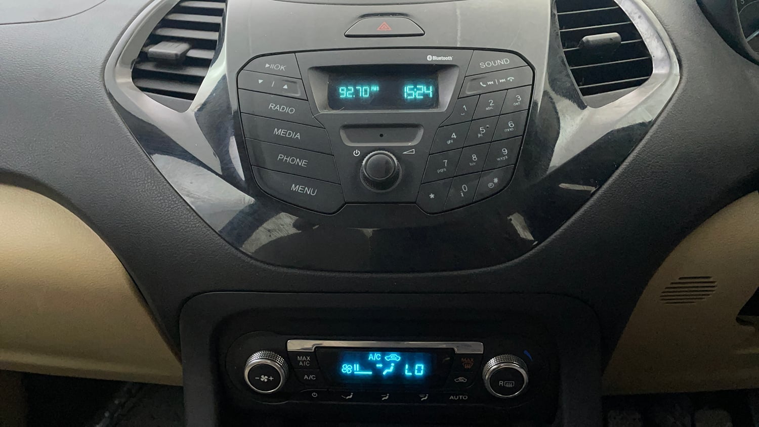 Used 2016 Ford Figo Aspire Titanium 1.2 Ti-VCT Petrol Manual interior MUSIC SYSTEM & AC CONTROL VIEW