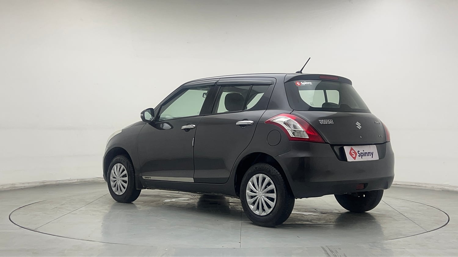 Used 2015 Maruti Suzuki Swift VXi Petrol Manual exterior LEFT REAR CORNER VIEW