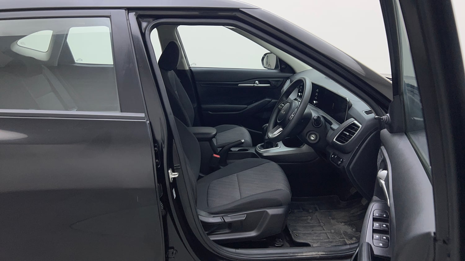 Used 2025 Kia Seltos HTE (O)1.5 Petrol MT Petrol Manual interior RIGHT SIDE FRONT DOOR CABIN VIEW
