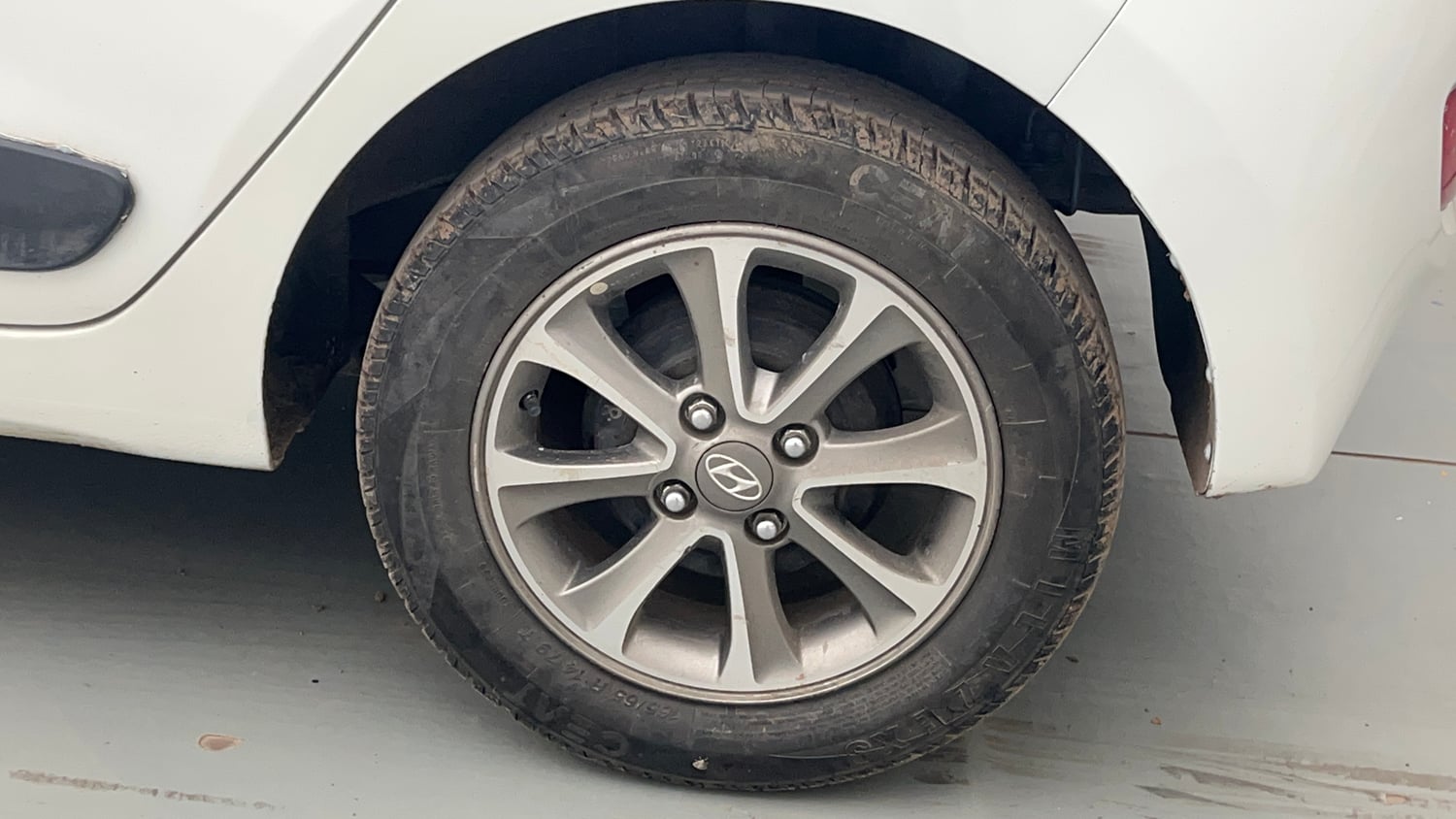 Used 2014 Hyundai Grand i10 Asta 1.2 Kappa VTVT (O) Petrol Manual tyres LEFT REAR TYRE RIM VIEW