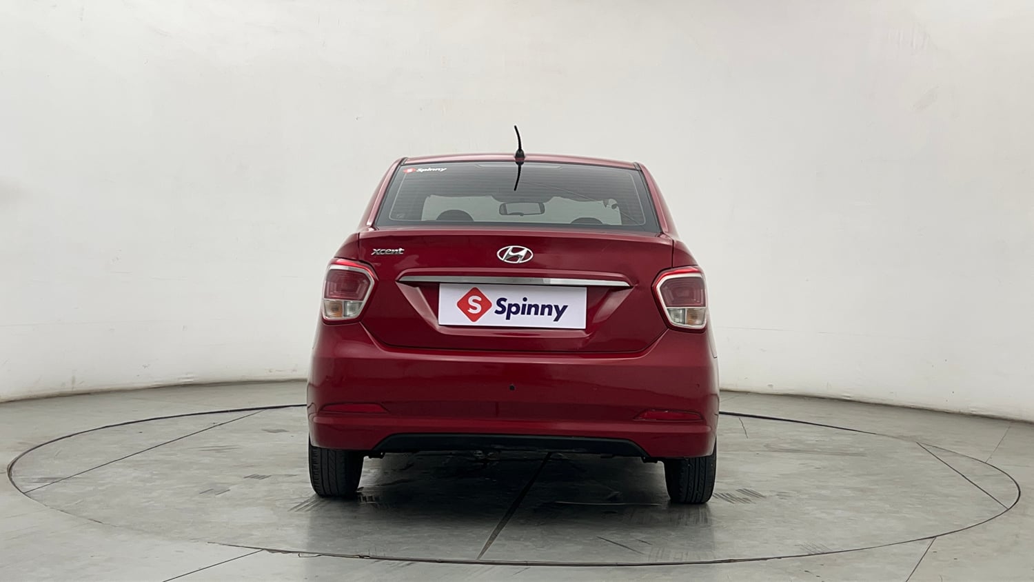 Used 2014 Hyundai Xcent SX 1.2 (O) Petrol Manual exterior BACK VIEW