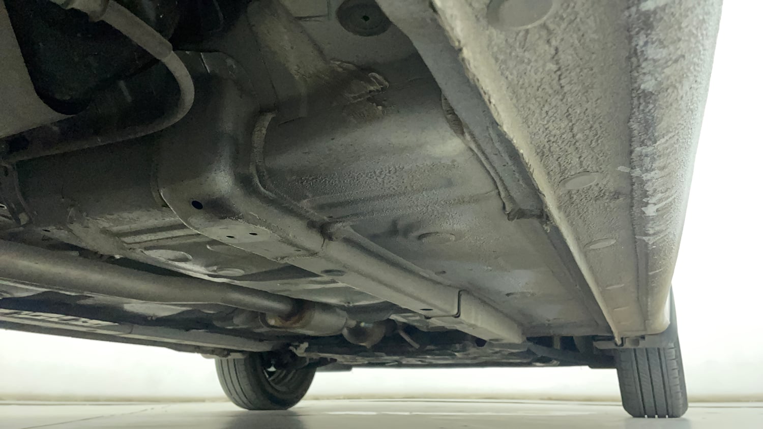 Used 2023 Hyundai Grand i10 Nios Sportz 1.2 Kappa AMT Petrol Automatic extra REAR RIGHT UNDERBODY VIEW