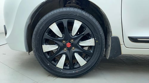 Used 2016 Maruti Suzuki Baleno Zeta 1.2 Petrol Manual tyres LEFT FRONT TYRE RIM VIEW