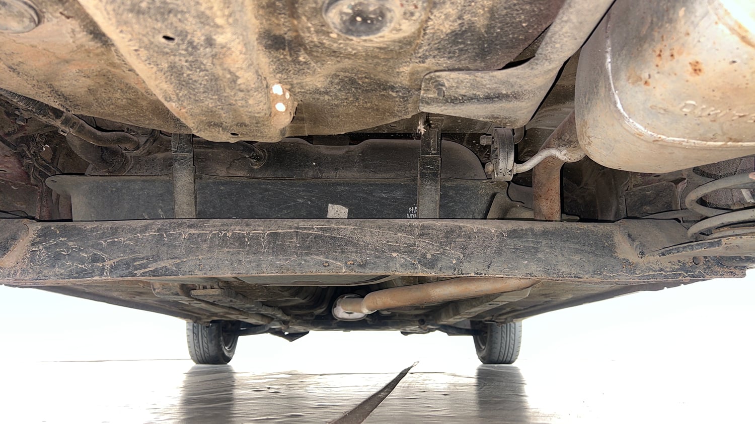 Used 2014 Hyundai Xcent SX 1.2 (O) Petrol Manual extra REAR UNDERBODY VIEW (TAKEN FROM REAR)