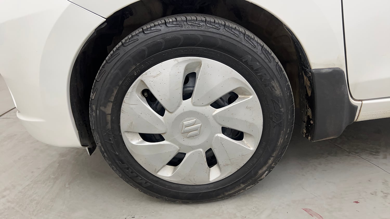 Used 2015 Maruti Suzuki Celerio VXi Petrol Manual tyres LEFT FRONT TYRE RIM VIEW