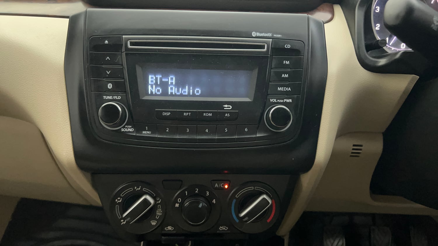 Used 2019 Maruti Suzuki Dzire VXi Petrol Manual top_features Integrated (in-dash) music system