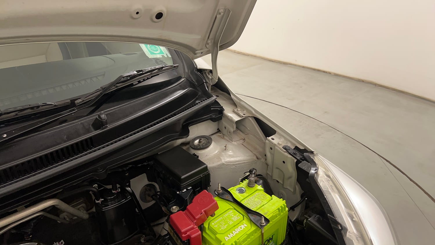 Used 2016 Maruti Suzuki Celerio VXi AMT Petrol Automatic engine ENGINE LEFT SIDE HINGE & APRON VIEW