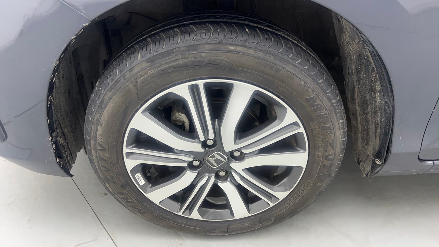 Used 2023 Honda Amaze VX 1.2 Petrol CVT Petrol Automatic tyres LEFT FRONT TYRE RIM VIEW