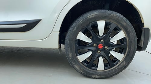 Used 2016 Maruti Suzuki Baleno Zeta 1.2 Petrol Manual tyres LEFT REAR TYRE RIM VIEW