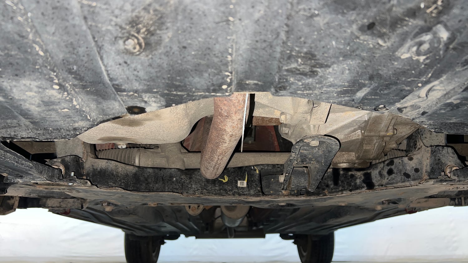 Used 2024 Maruti Suzuki Brezza Zxi Plus Dual Tone Petrol Manual extra FRONT LEFT UNDERBODY VIEW