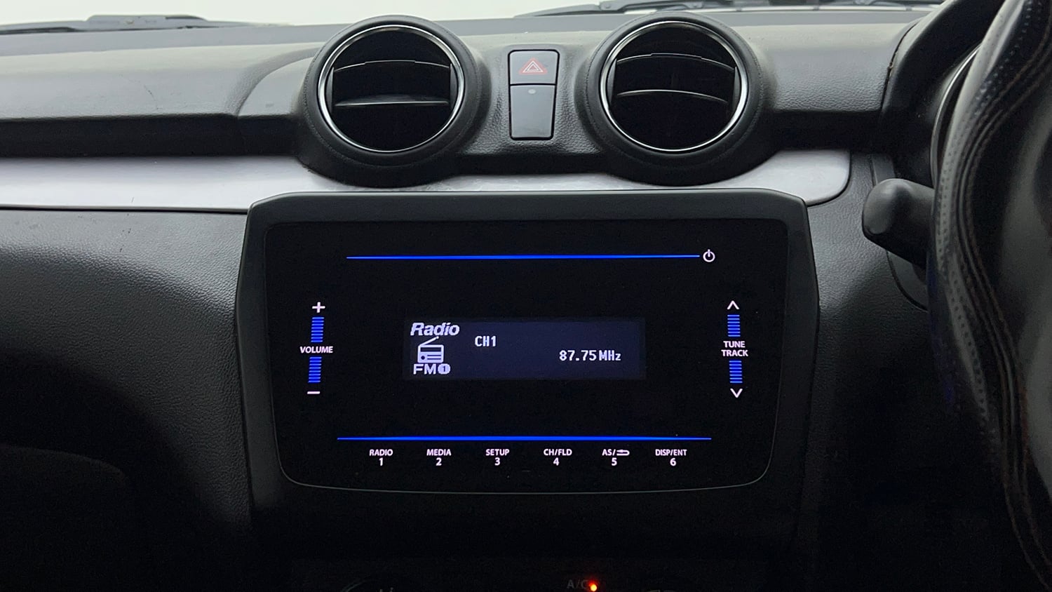 Used 2021 Maruti Suzuki Swift VXi AMT Petrol Automatic top_features Integrated (in-dash) music system