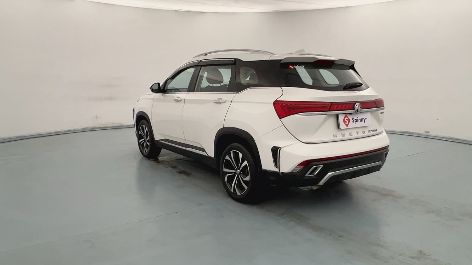 Used 2023 MG Motors Hector Plus Savvy Pro 1.5 Turbo Petrol CVT 7 STR Petrol Automatic exterior LEFT REAR CORNER VIEW